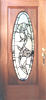 oval mahogany door with oval rose leaded glass window