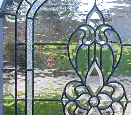 Custom leaded glass arched beveled window