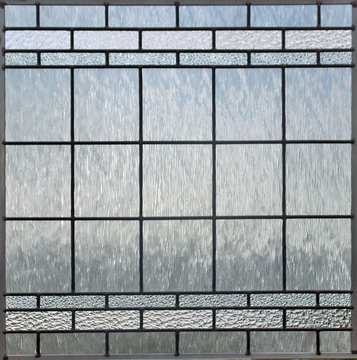 Center of the pass&ndash;through leaded glass room divider windows