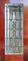 mahogany door with abstract 38 leaded glass window